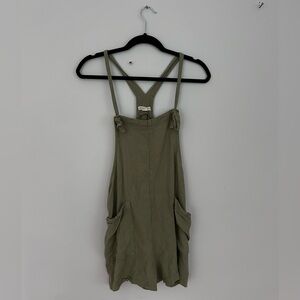 Sage green romper with adjustable straps